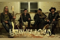 HEAVY LOAD wollen Digital-Debüts der ersten Studio-Alben veröffentlichen. Video-Single «We Rock the World» soll jetzt die Stimmung dazu anheizen